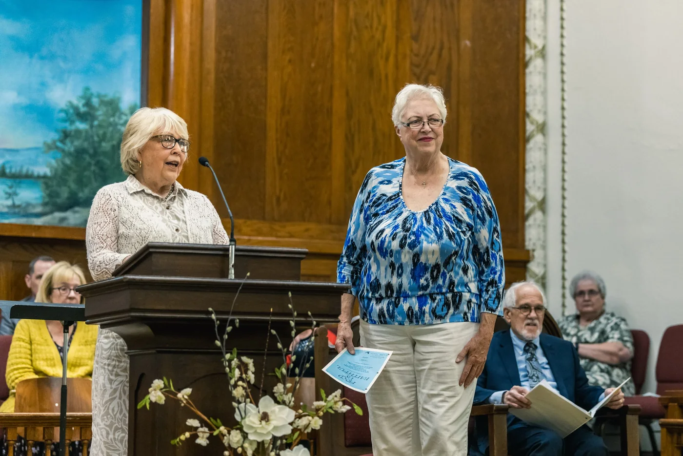 People at the front of Olivet’s sanctuary during its 115th anniversary gathering.