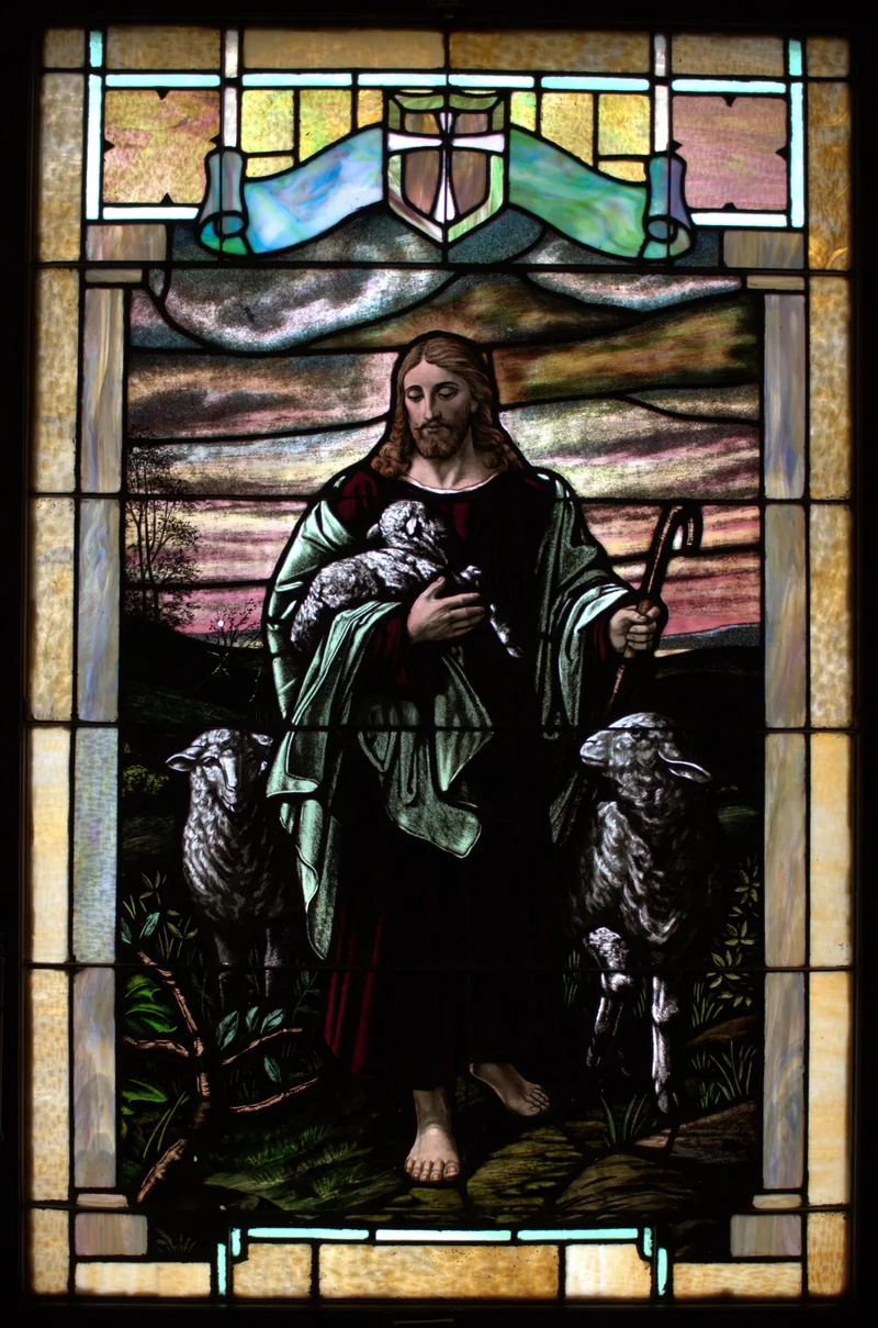 A photographed stained-glass window in Olivet’s church depicting Jesus as the Good Shepherd.